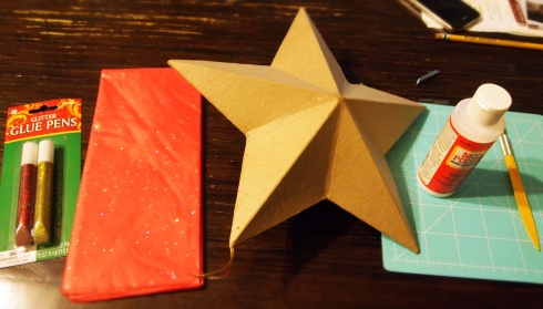cardboard star, tissue paper, glitter pen